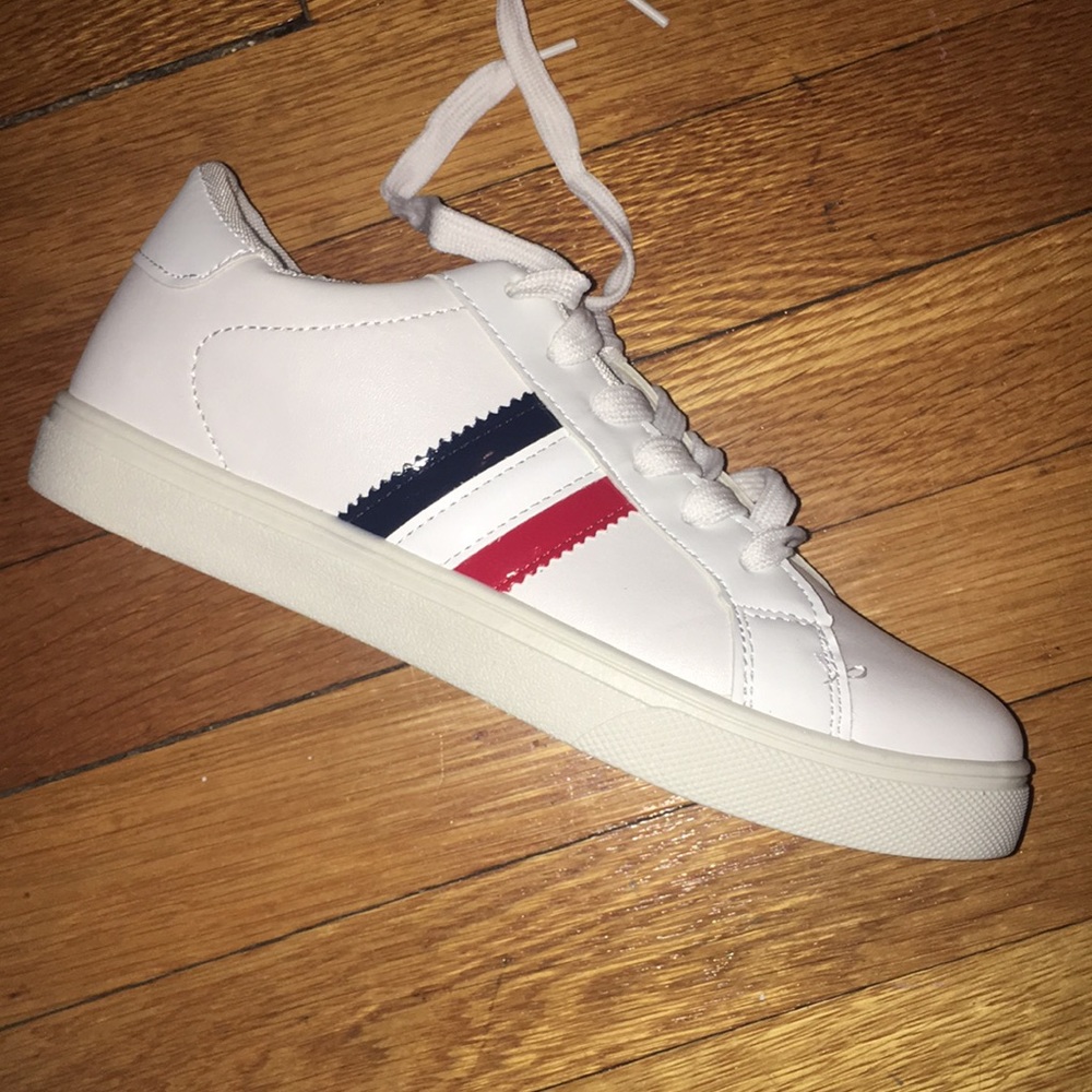 Women’s white sneakers. Never been worn.